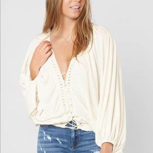 Oversized lace up top!